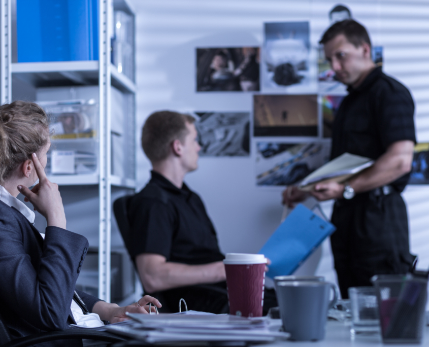 Detectives working in private agency and conducting an investigation